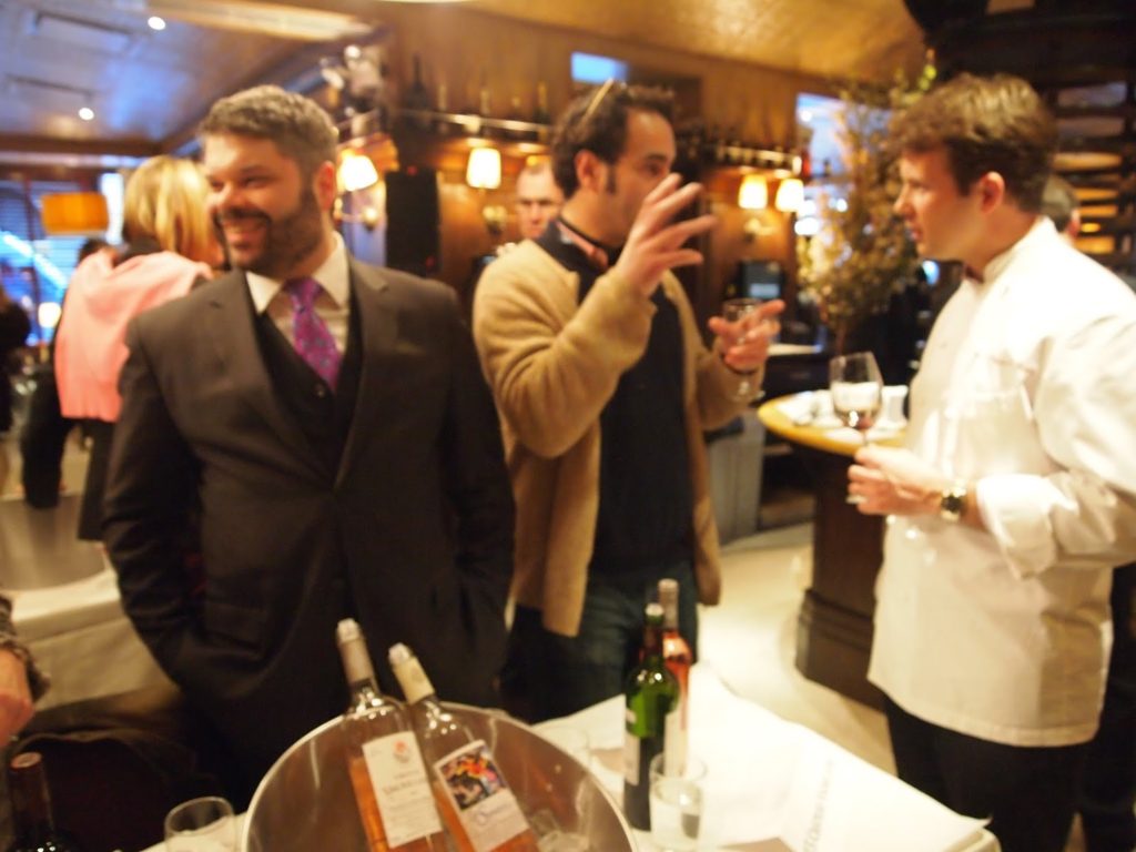 Chef Florian Hugo chats with the folks at the Chateau Vignelaure table where wines were served that my husband throoughly enjoyed.