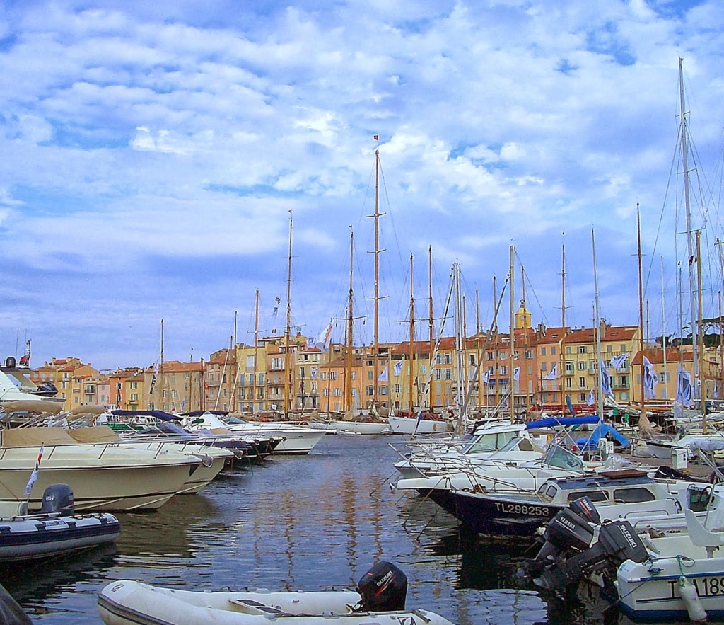 Saint Tropez Harbor.  Many of these building were damaged in 1944 when the Germans mined the port. Novelist Colette led the vanguard to rebuild them. Photo by Pamela J. O'Neill